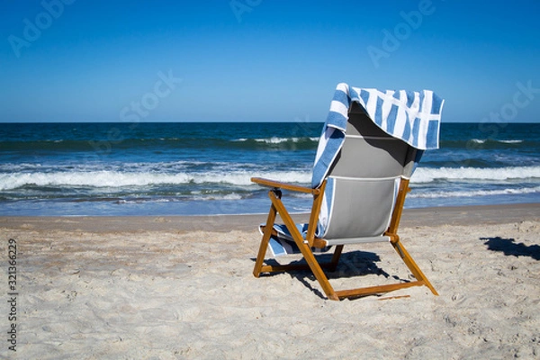Fototapeta Resort chair with beach view