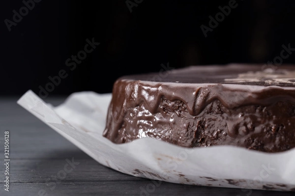 Obraz Prague Cake. Cake on the table. Prague chocolate cake on plate. chocolate brownie cake dessert. Free space for text