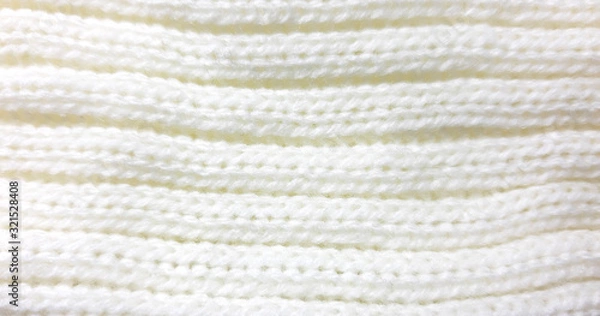 Fototapeta Light coloured knitted delicate texture, background. Fashion pattern modern, photo backdrop surface empty