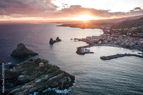 Obraz Top view of Aci Trezza, Lachea Island and the Ciclope Stacks at sunset. Sicily, Italy