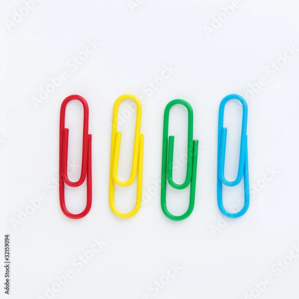 Fototapeta Set of Colorful paperclip on white backgrond