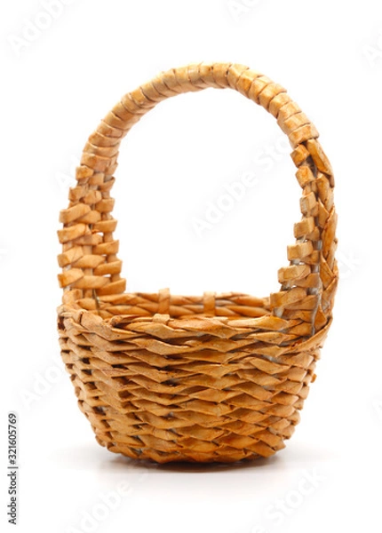Fototapeta Empty small basket woven from paper on a white background