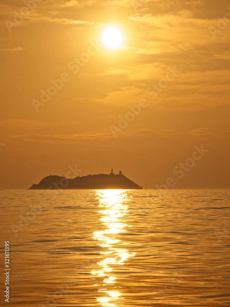 Obraz Island silhouette at sunset 