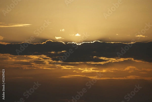 Obraz Sunrise covered by clouds 