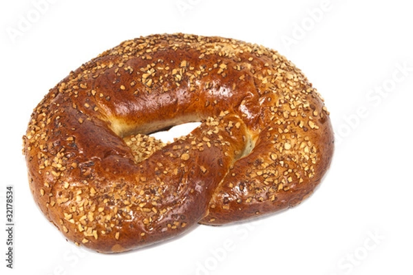 Fototapeta Pretzel with crushed nuts.