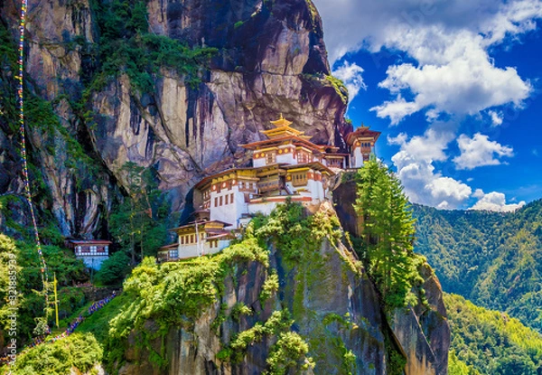 Fototapeta Tiger nest monastery on a bright bluesky day, Taktshang Goemba, Paro, Bhutan