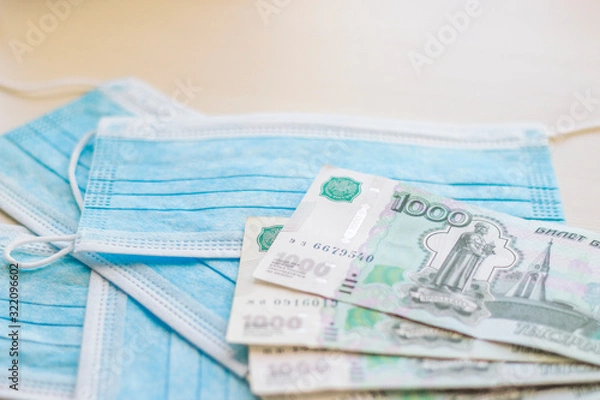Obraz medical mask money on a white background