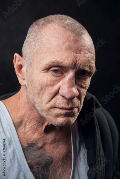 Obraz Closeup portrait of an old homeless alcoholic man