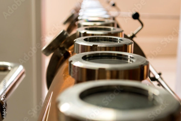 Obraz Details of the windows of a distiller machine to distill alcohol