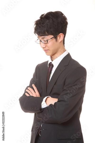 Obraz 腕を組む男性