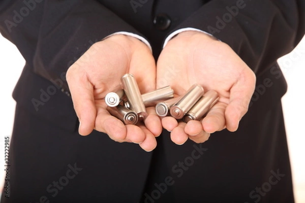 Obraz 電池を持つ手