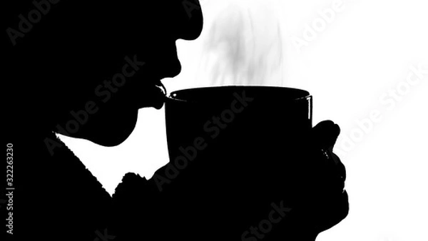 Obraz black silhouette of a girl on a white background who is drinking a hot drink from a mug