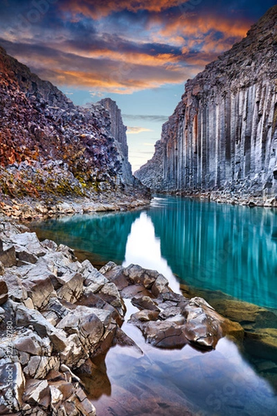 Obraz Studlagil basalt canyon, Jokulsa a Dal River. Iceland, Europe.  One of the most wonderfull hidden place and nature sightseeing. Famous tourist landscape with basalt rock formations. Travel postcard.