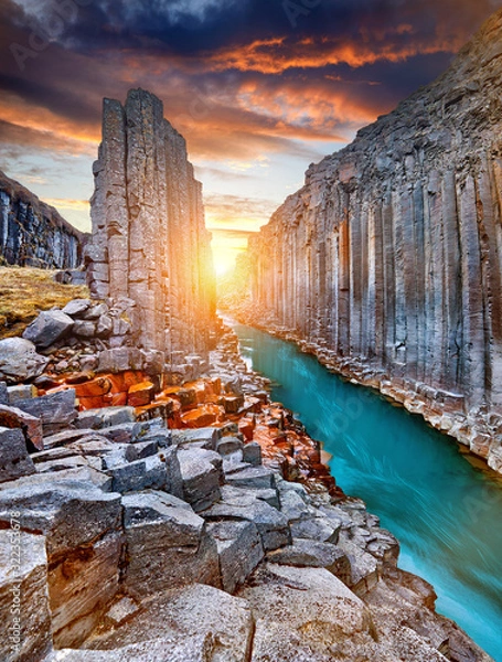 Obraz Studlagil basalt canyon, Jokulsa a Dal River. Iceland, Europe.  One of the most wonderfull hidden place and nature sightseeing. Famous tourist landscape with basalt rock formations. Travel postcard.