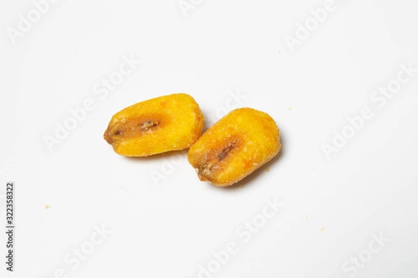 Fototapeta Roasted corn nuts on white background