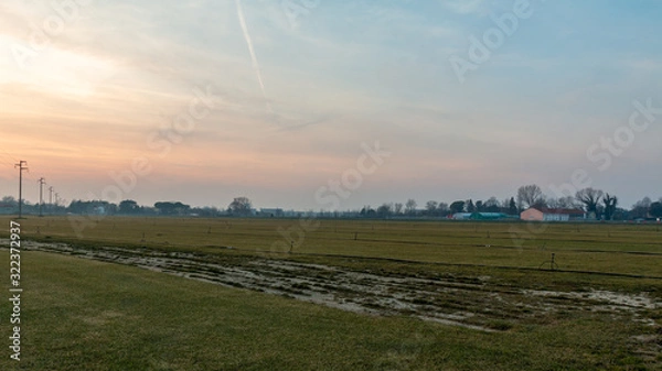 Obraz zachód słońca nad wsią