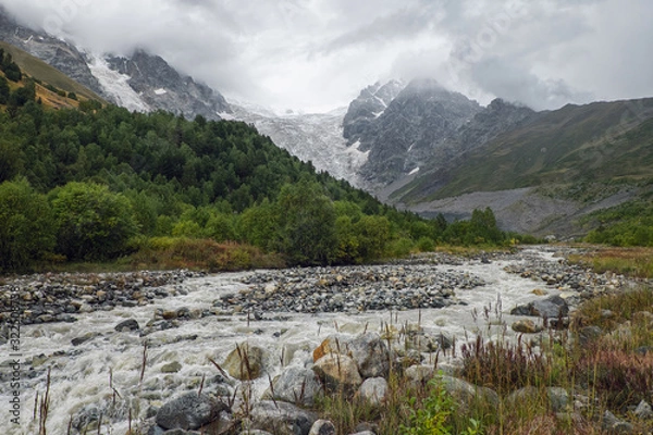 Fototapeta Ice river Adishi and glacier Lardaad on background in mountains of Svaneti Georgia