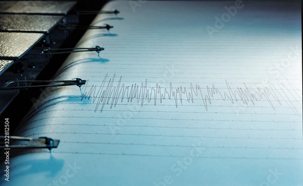 Fototapeta Swinging needle of seismograph at earthquake.