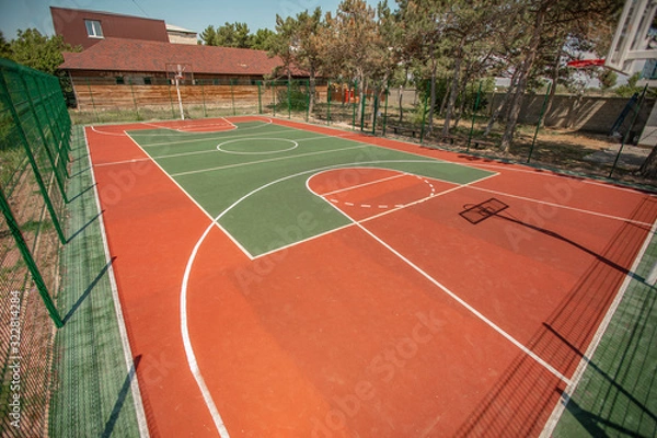 Fototapeta Basketball ground in a public park. Sports basketball court from different angles without people