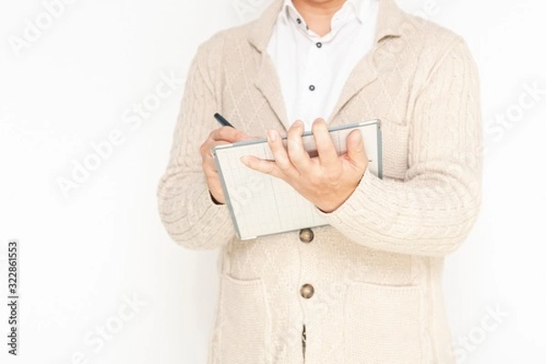 Fototapeta メモを書く男性