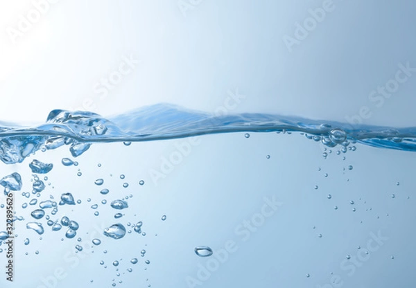 Fototapeta Water splash. Aqua flowing in waves and creating bubbles. Drops on the water surface feel fresh and clean. isolated on white background.