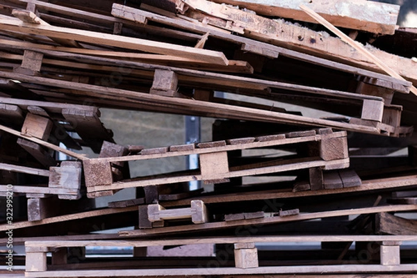 Fototapeta Old broken wooden pallets heap. 