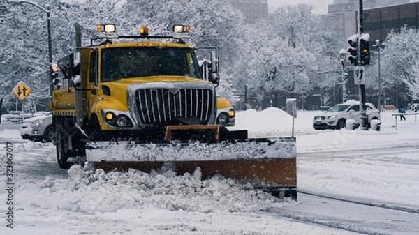 Fototapeta large snowplow in the snow