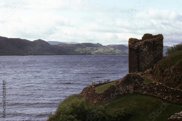 Obraz Ruins of an ancient fortress on the banks of Loch ness High Land. Scotland. Great Britain.  Photo on 35 mm film.