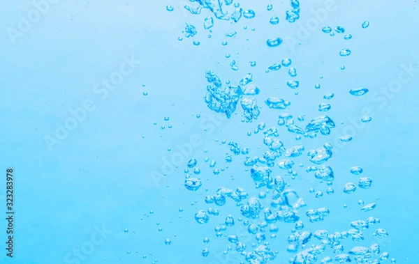 Fototapeta The bubbles under the blue water