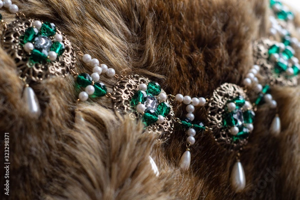 Fototapeta Schmuckstück auf Fell