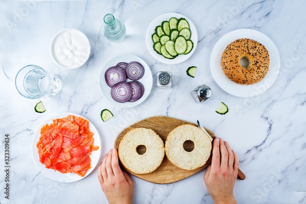 Obraz Marble table with ingredients for making bagel or sandwich for lunch