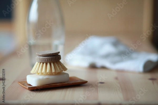 Fototapeta Solid soap and compostable dish brush in a zero waste household