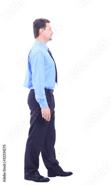 Fototapeta Full length profile of a middle aged business man