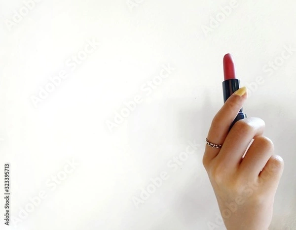 Obraz hand with pencil and eraser on white background