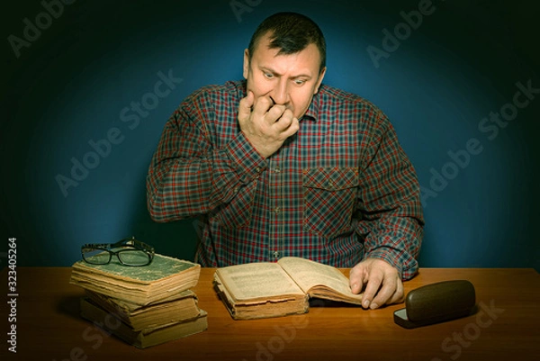 Obraz Portrait of the director, playwright, writer, reader. Emotional experience bright and strong. Fascinating detective story and thriller.