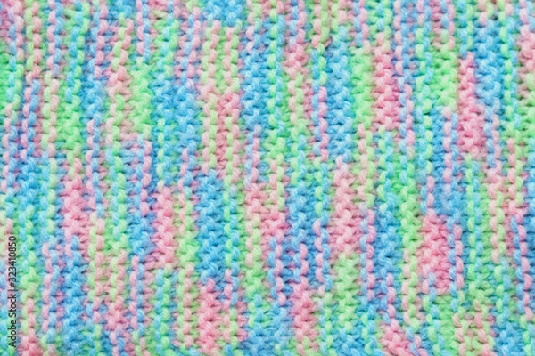 Obraz Textured knitted color background. Selective focus. Soft yarn. Handmade