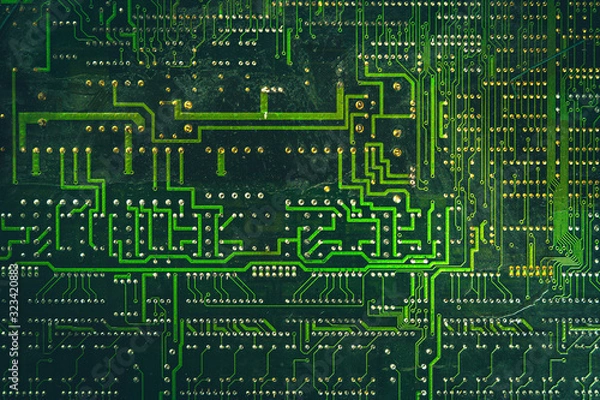 Obraz Back side of an old green curcuit board.