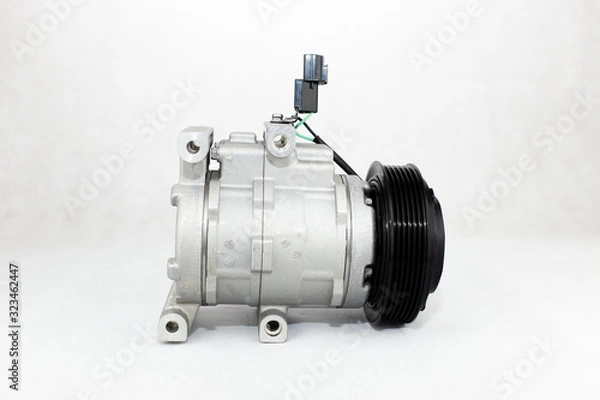 Fototapeta New car air conditioning compressor on white background