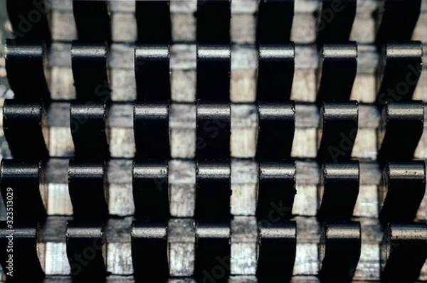 Fototapeta Black heat sink for cooling the microprocessor of the computer board. Close up