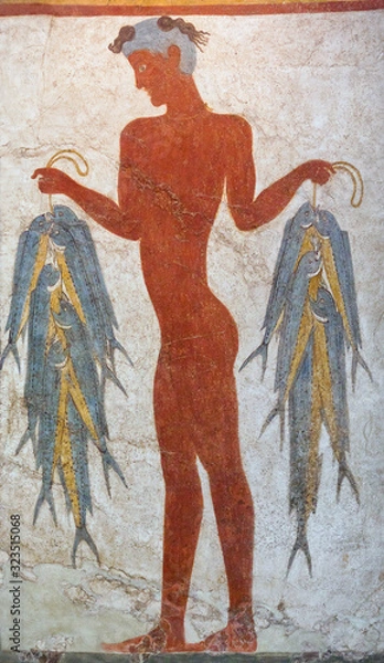 Fototapeta Wall painting of a young fisherman holding string of fish  from Minoan Settlement of Akrotiri on Santorini, Greece