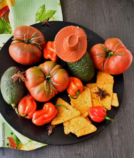 Obraz national Mexican sombrero next to cacti, tomatoes and chips