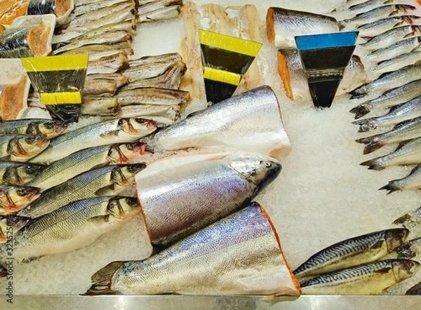 Fototapeta Fresh fish in ice with price tags