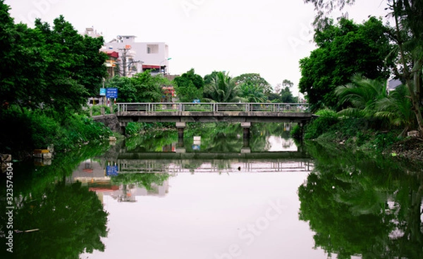 Obraz dirty river in hanoi