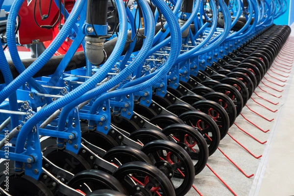 Fototapeta Modern high-precision seeder. Row seeder.