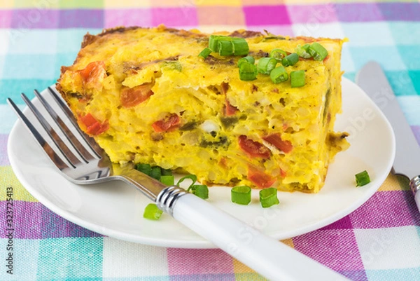 Obraz Breakfast casserole with bacon, potatoes, vegetables.