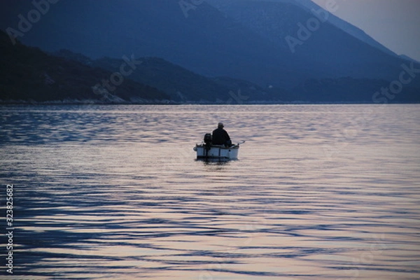 Obraz samotny rybak,