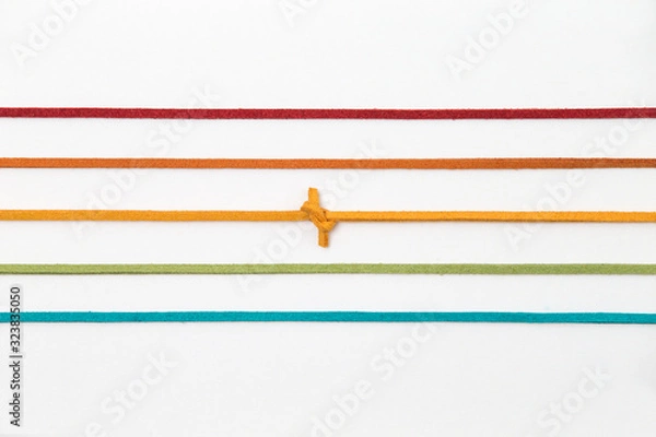 Obraz color strings line pattern on white background. orange thread with knot isolated. 