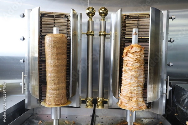 Obraz meat on the grill shawarma for kebab