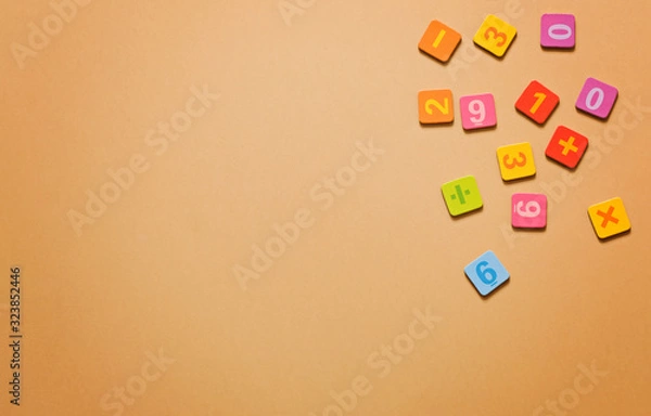 Obraz School background - numbers on beige background with copy space. Mathematics concept, math