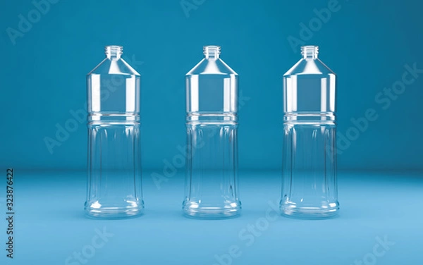 Obraz Plastic bottles on blue background.